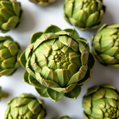 Close-Up of Fresh Artichokes on White Background