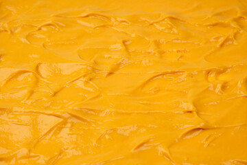 Yellow sauce splashes as a background.