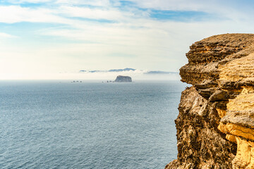 Dramatic landscape with the rocky coastline of the Pacific ocean in Paracas National Reserve, Peru.
