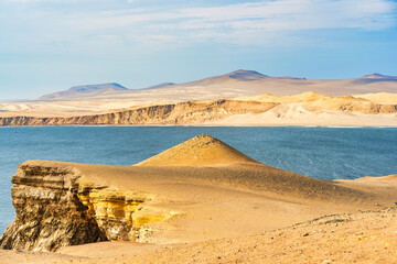 Dramatic landscape with the rocky coastline of the Pacific ocean in Paracas National Reserve, Peru.