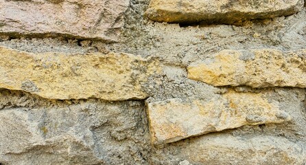 Rock sandstone brick wall.