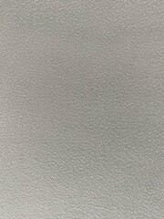 Close-up of a white, textured surface