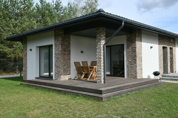Modern luxury villa exterior in minimal scandinavian style, 3d render
