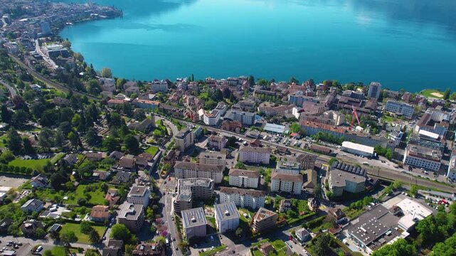 A panoramic aerial view around the city Clarens in Switzerland on a sunny spring noon beside Montreux