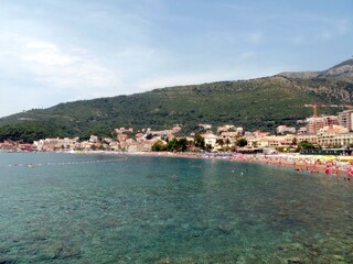 Relaxing Beach Day in Petrovac, Montenegro With Clear Waters and Vibrant Summer Activities