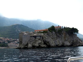 Exploring the Unique Architecture of Sveti Stefan Island Resort in Montenegro Amid Morning Mist