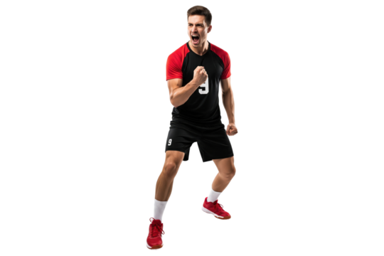 Male volleyball player in a black and red uniform cheering loudly with clenched fists