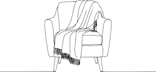 Continuous line art drawing of a cozy armchair with a blanket thrown 