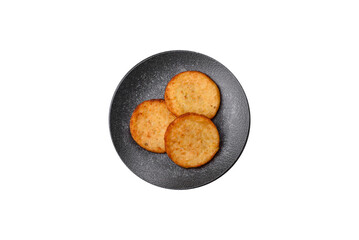 Hash browns, a breakfast food made of potatoes, onions and vegetables. Hash browns with potatoes