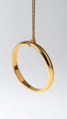 Gold Bangle Bracelet with Chain on White Background