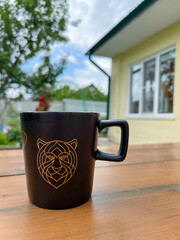 a mug is on the table in the country house