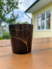 a mug is on the table in the country house