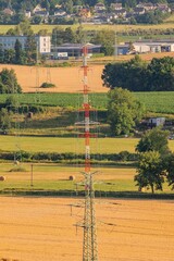 Very high voltage power lines above spring landscape in aerial photo