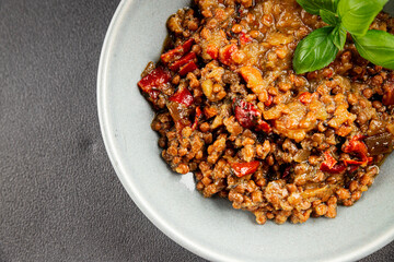 Lentil dish vegetables and roasted peppers savory vegetable fresh vegetarian and vegan food gourmet food background on the table rustic food top view copy space keto and paleo diet