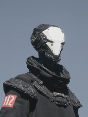 Futuristic robot with a sleek design in an outdoor setting during daylight