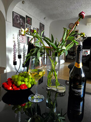 Elegant Still Life with Wine, Champagne, and Fresh Fruit
