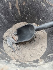 Metal Bucket Filled with Wood Ash