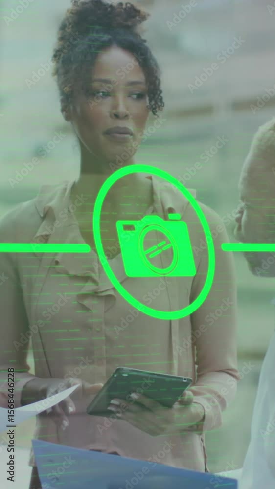 Poster animation of icons connected with lines over diverse coworkers discussing reports in office