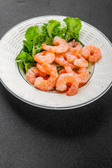 Shrimp salad prawns seafood fresh pescetarian diet gourmet food background on the table rustic food top view copy space keto and paleo diet vegetarian food