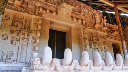 Magnificent white stucco façade and entrance to the tomb of Ukit  Kan Lek Tok through the jaws of...