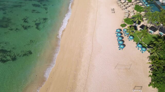 Drone point of view at Nico beach at sunny day. Perfect holiday location.Nusa Dua.Bali