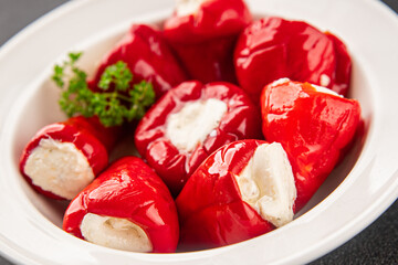 Hot peppers cheese filling pickled vegetables appetizer fresh delicious gourmet food vegetarian...
