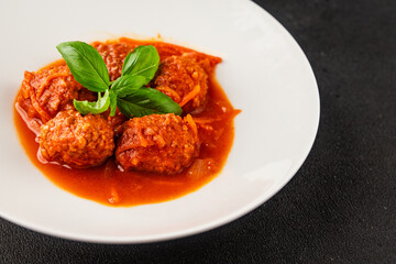 Meatballs tomato sauce beef, pork or chicken meat fresh delicious gourmet food background on the table rustic food top view copy space keto and paleo diet