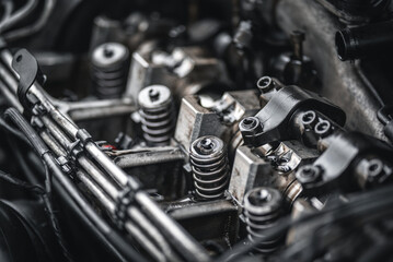 Intricate internal engine components of a vehicle are shown in a detailed close-up shot.