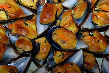 Mussels au gratin with all-i-oli sauce, an extraordinary starter for a winter dinner