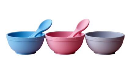 Colorful silicone baby bowls with matching spoons. Transparent PNG. Blue, pink, and lavender feeding sets isolated on white for parenting, infant meal prep, or baby product ads.