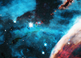 A vivid cosmic scene showcasing a nebula with glowing stars, swirling clouds of gas, and contrasting shadows. Elements of this illustration were furnished by NASA.