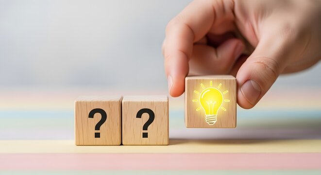 Hand placing a wooden block with a lightbulb symbol next to question mark blocks.