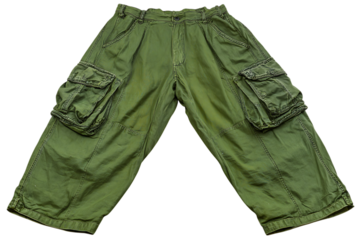 Classic green cargo pants with multiple pockets and a relaxed fit isolated on a transparent background
