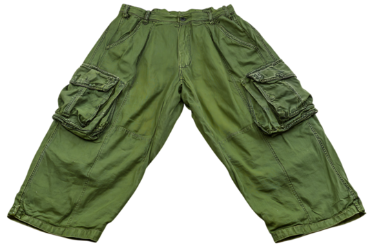 Classic green cargo pants with multiple pockets and a relaxed fit isolated on a transparent background