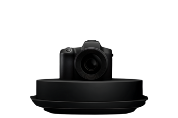 Modern black digital camera with lens displayed on a circular black platform isolated on transparent background
