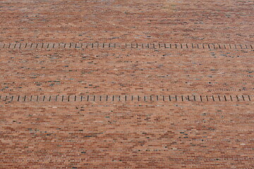 Red brick wall. Upward angle with nice design.