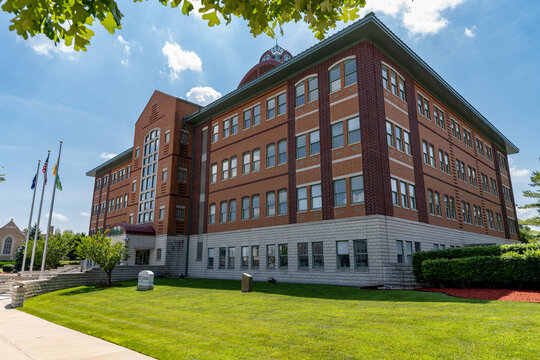 Clinton County Courthouse in St Johns Michigan with Blue Sky and Clouds