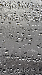 background, unusual, abstract. drops of morning dew, condensation on the glass. wet glass. water drops close-up. beautiful background for text. Spray cool condensate water on the glas