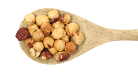 Whole peeled hazelnuts in wooden spoon isolated on white background, top view
