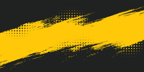 Yellow grunge brush streaks painting on black background