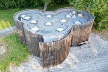 The building has organic shapes that completely contradict the conventional perception of public...