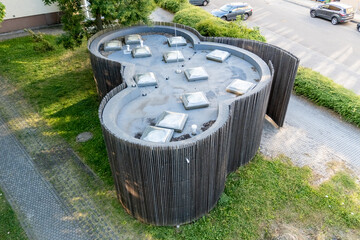 The building has organic shapes that completely contradict the conventional perception of public...