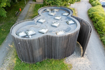 The building has organic shapes that completely contradict the conventional perception of public...