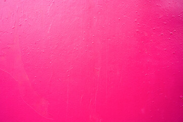 Vibrant pink textured wall creating a striking backdrop