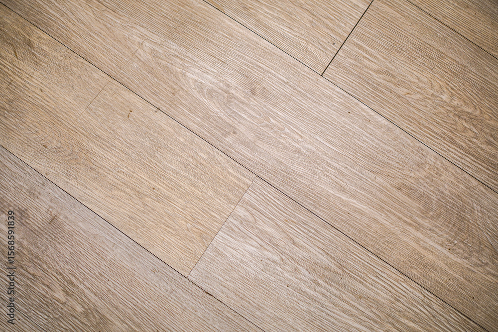 Poster a textured surface showcasing parallel wooden planks, creating an authentic rustic backdrop. its ang
