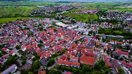 Aerial panoramic view of the city Brackenheim in Germany on a cloudy noon in spring.