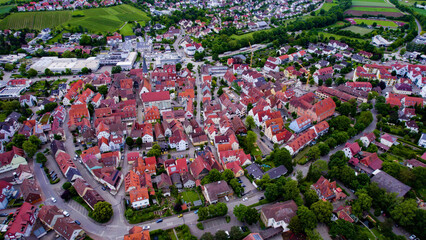 Aerial panoramic view of the city Brackenheim in Germany on a cloudy noon in spring.
