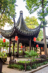 Pavilion, a symbol of relaxation and contemplation in Nanxiang, Shanghai, China. The tiled roof,...