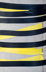 Black and yellow tape texture background.