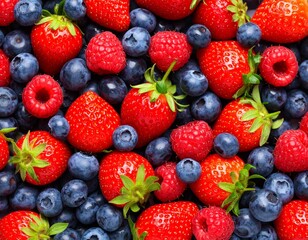 Fototapeta premium Vibrant Mix of Fresh Strawberries, Blueberries, and Raspberries